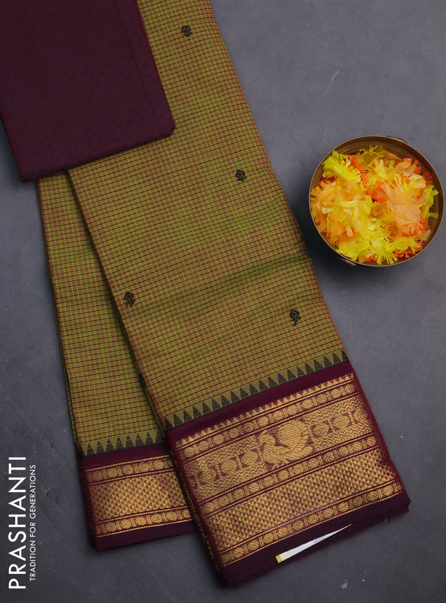 Chettinad cotton saree dual shade of green and dark magenta pink with allover checked pattern and temple disign zari woven border