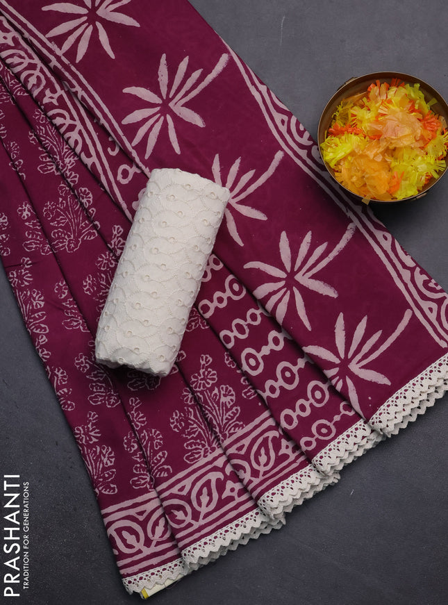 Semi pashmina silk saree wine shade with allover floral butta prints and crocia lace work border