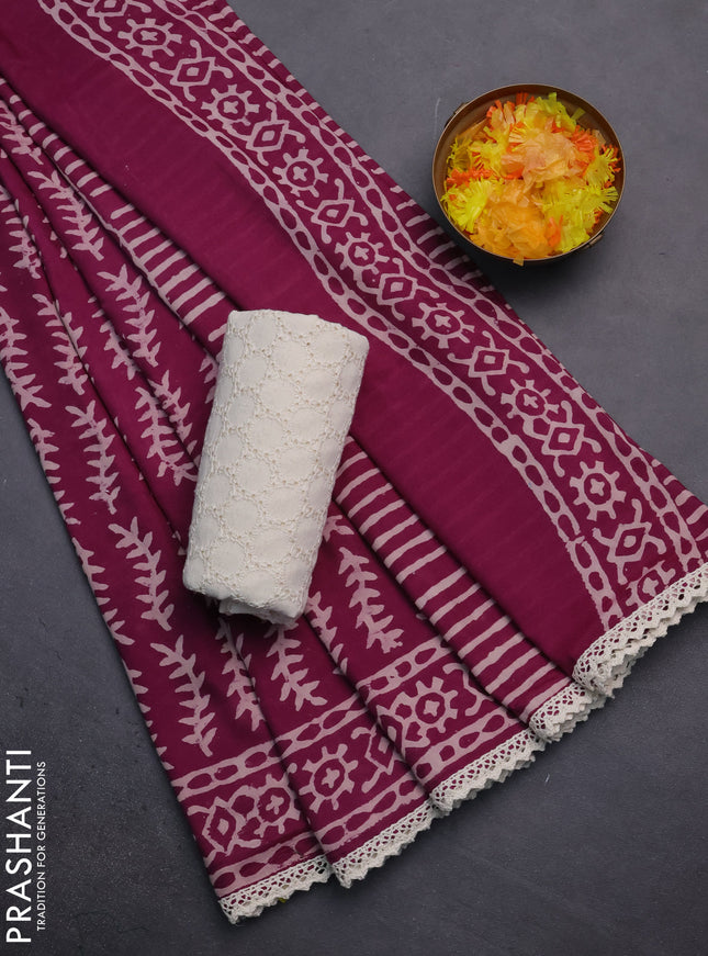 Semi pashmina silk saree wine shade and cream with allover prints and crocia lace work border