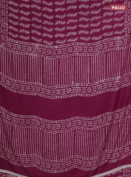 Semi pashmina silk saree wine shade and cream with allover prints and crocia lace work border