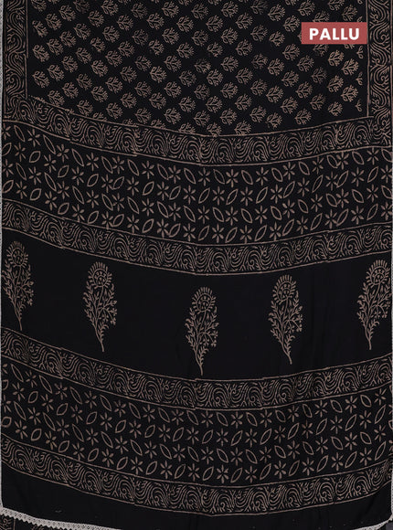 Semi pashmina silk saree black and cream with allover butta prints and crocia lace work border