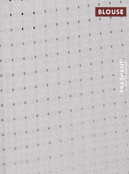 Semi pashmina silk saree black and cream with allover butta prints and crocia lace work border