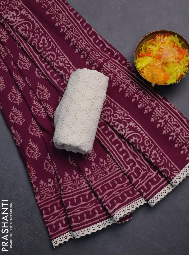 Semi pashmina silk saree wine shade and cream with allover butta prints and crocia lace work border