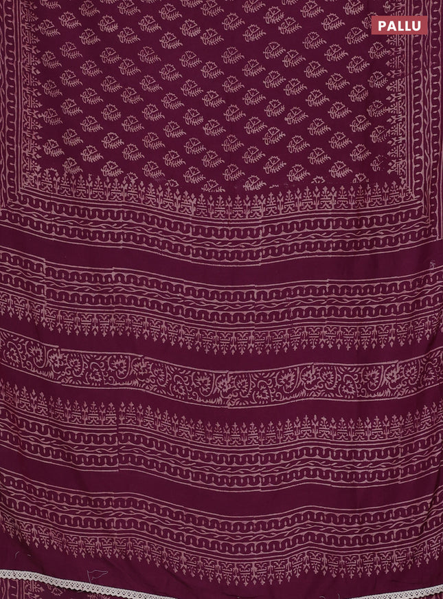 Semi pashmina silk saree wine shade and cream with allover butta prints and crocia lace work border