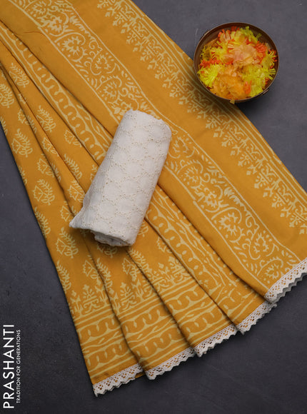 Semi pashmina silk saree mustard yellow and cream with allover butta prints and crocia lace work border