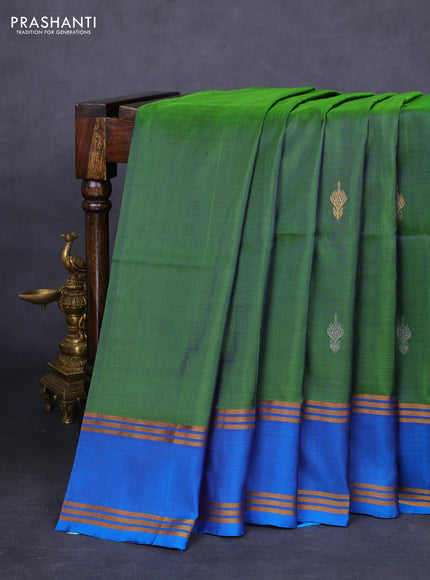 Pure uppada silk saree green and cs blue with silver & gold zari woven buttas and rettapet zari woven border