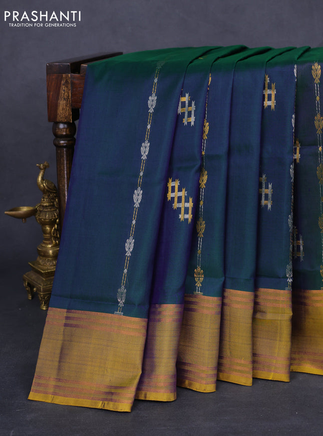 Pure uppada silk saree dual shade of greenish blue and yellow with allover silver & gold zari weaves and rettapet zari woven border
