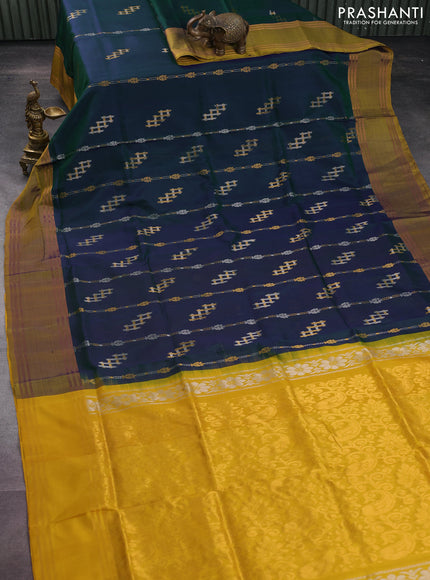 Pure uppada silk saree dual shade of greenish blue and yellow with allover silver & gold zari weaves and rettapet zari woven border
