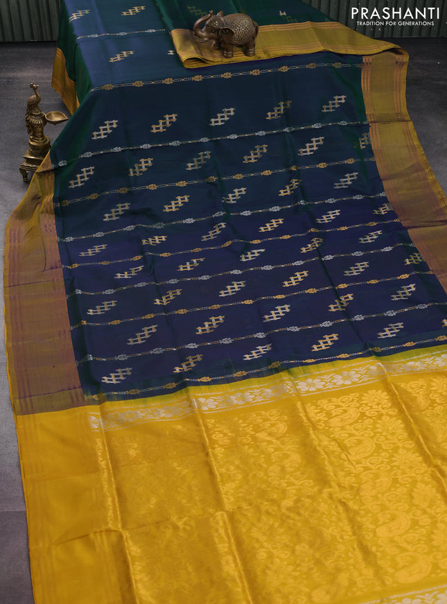 Pure uppada silk saree dual shade of greenish blue and yellow with allover silver & gold zari weaves and rettapet zari woven border