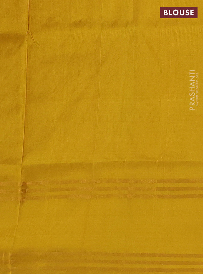 Pure uppada silk saree dual shade of greenish blue and yellow with allover silver & gold zari weaves and rettapet zari woven border