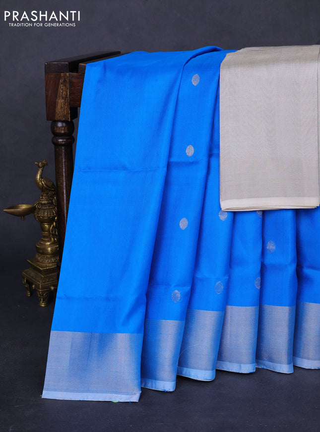 Pure uppada silk saree cs blue with silver zari woven coin buttas and silver zari woven border