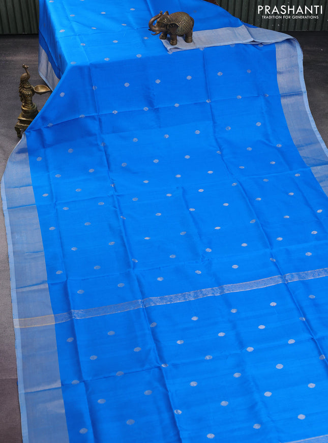 Pure uppada silk saree cs blue with silver zari woven coin buttas and silver zari woven border