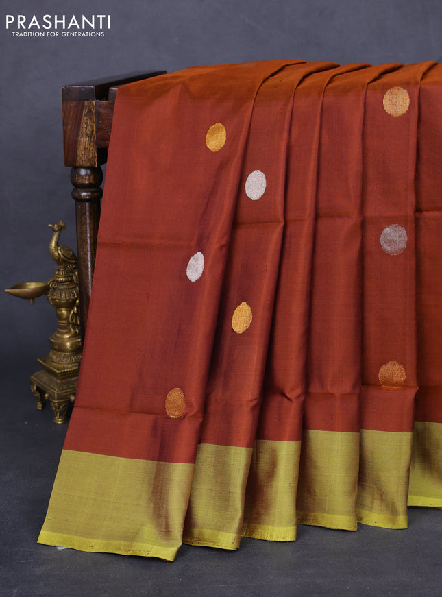 Pure uppada silk saree brown and lime yellow with silver & gold zari woven coin buttas and simple border