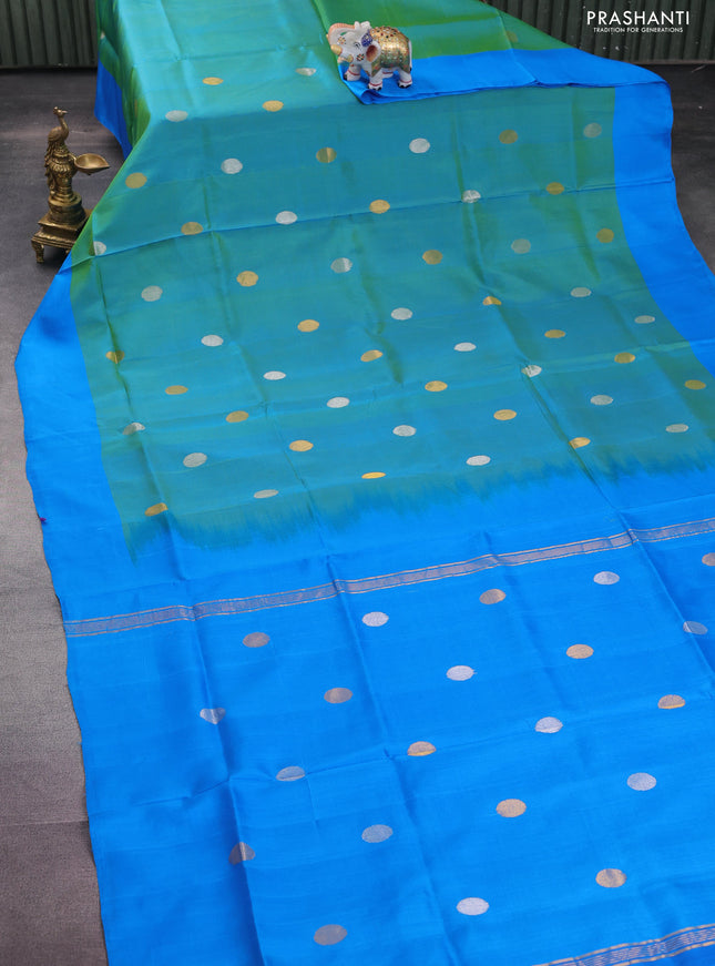 Pure uppada silk saree dual shade of teal green and cs blue with silver & gold zari woven coin buttas and simple border