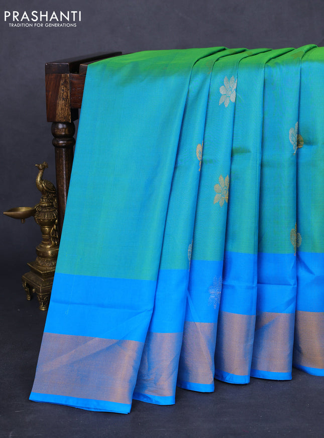 Pure uppada silk saree dual shade of teal bluish green and cs blue with silver & gold zari woven buttas and zari woven border