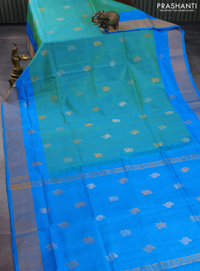 Pure uppada silk saree dual shade of teal bluish green and cs blue with silver & gold zari woven buttas and zari woven border