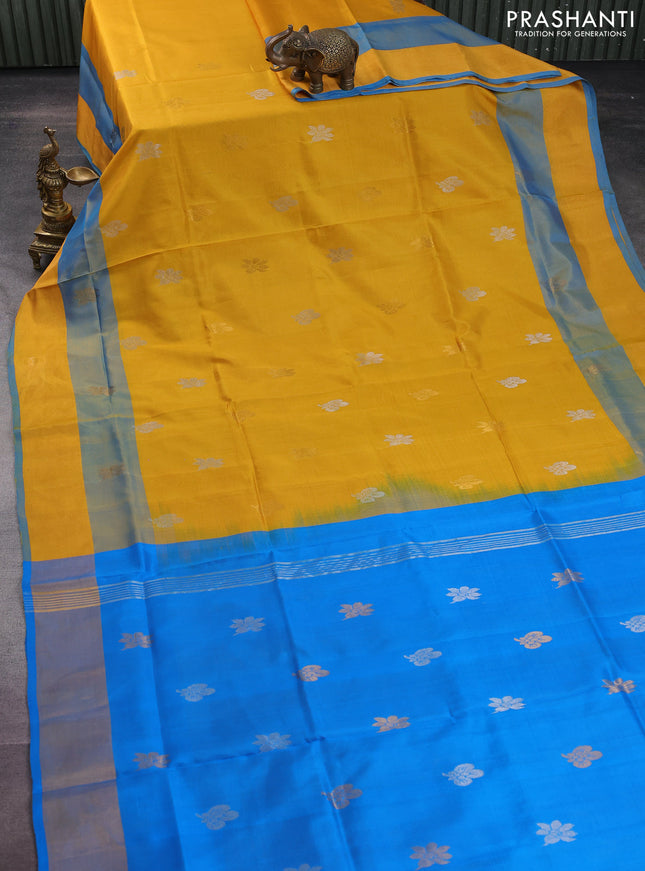 Pure uppada silk saree yellow and cs blue with silver & gold zari woven buttas and zari woven border