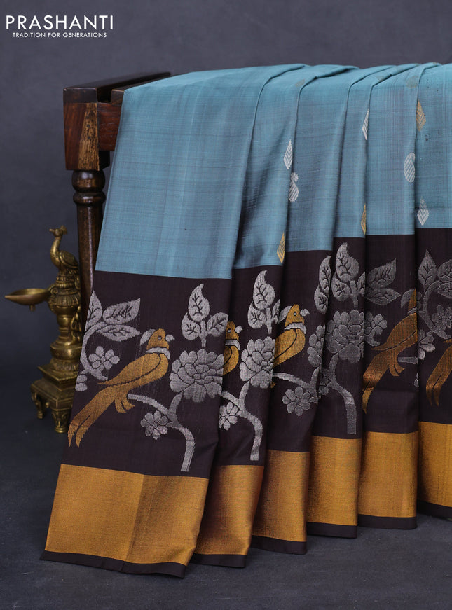 Pure uppada silk saree pastel blue shade and coffee brown with silver & gold zari woven buttas and parrot design zari woven border