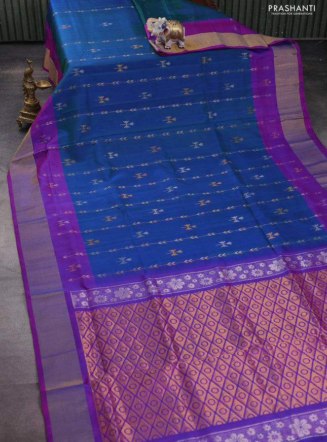 Pure uppada silk saree dual shade of bluish green and purple with allover silver & gold zari weaves and zari woven border