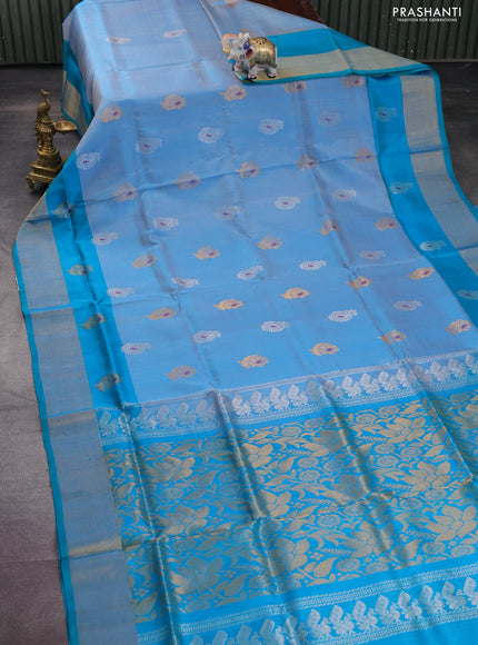 Pure uppada silk saree pastel blue and teal blue with silver & gold zari woven buttas and zari woven border
