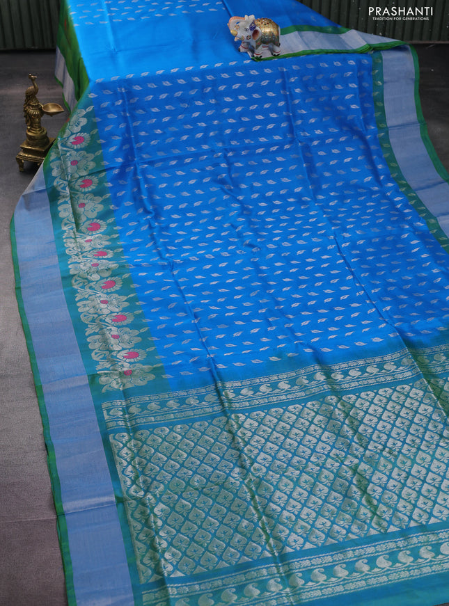 Pure uppada silk saree cs blue and dual shade of green with allover silver zari woven leaf buttas and silver zari woven border