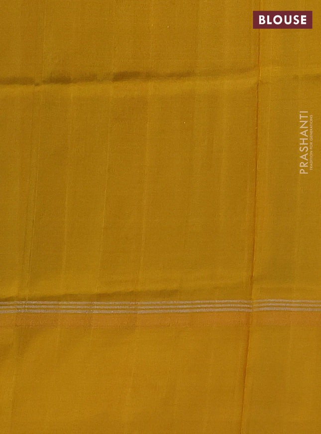 Pure uppada silk saree dual shade of green and mehendi green with silver & gold zari woven buttas and zari woven simple border