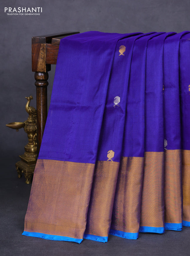 Pure uppada silk saree dark blue and cs blue with silver & gold zari woven buttas and long zari woven border