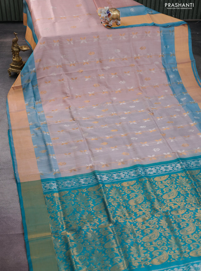 Pure uppada silk saree pastel peach and teal blue with allover silver & gold zari weaves and zari woven border