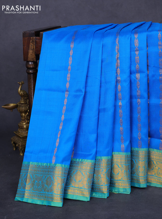 Pure uppada silk saree cs blue and dual shade of green with allover zari weaves and zari woven border
