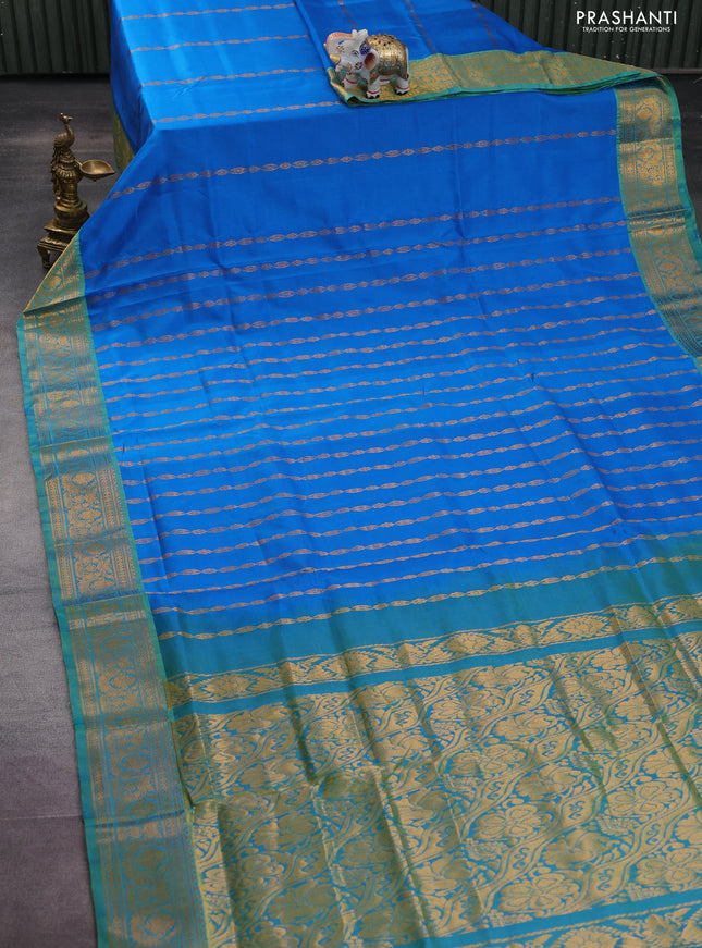 Pure uppada silk saree cs blue and dual shade of green with allover zari weaves and zari woven border
