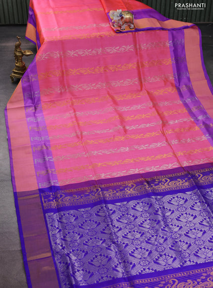 Pure uppada silk saree dual shade of peach pink and blue with allover silver & gold zari weaves and zari woven border