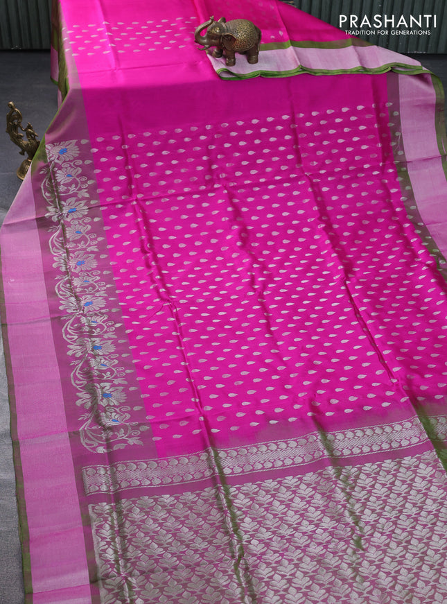 Pure uppada silk saree magenta pink and dual shade of green with allover silver zari woven thilak buttas and floral design silver zari woven border