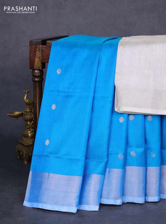 Pure uppada silk saree cs blue with silver zari woven coin buttas and silver zari woven border