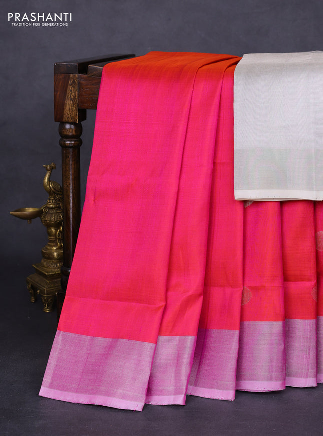 Pure uppada silk saree dual shade of pinkish orange with silver zari woven coin buttas and silver zari woven border