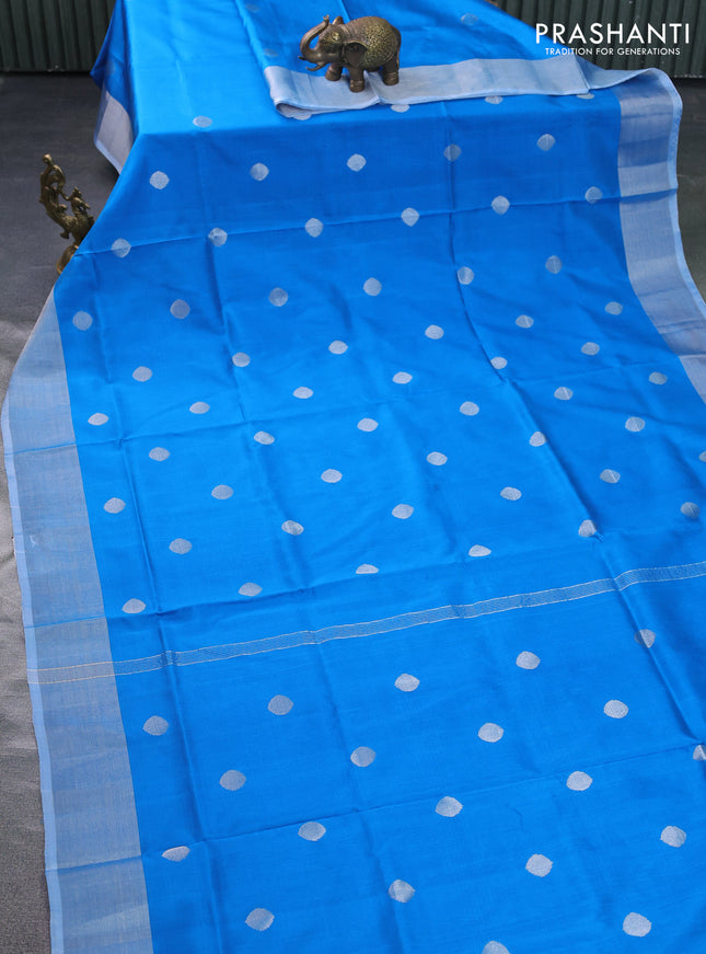 Pure uppada silk saree cs blue with silver zari woven coin buttas and silver zari woven border