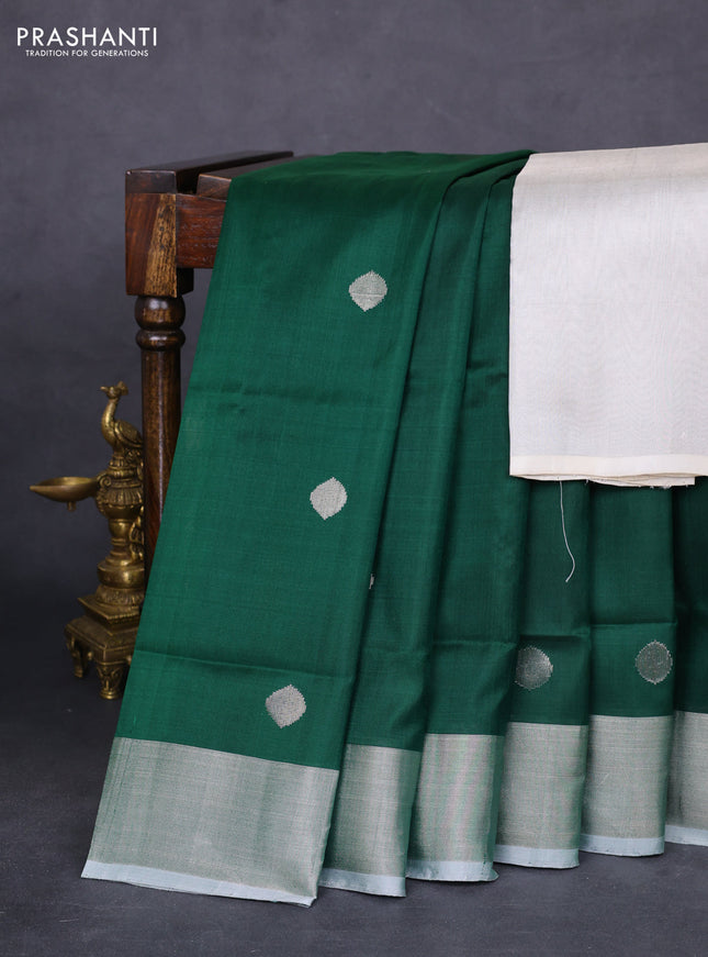 Pure uppada silk saree bottle green and grey with silver zari woven coin buttas and silver zari woven border