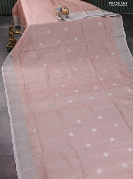 Pure uppada silk saree pastel peach with silver zari woven coin buttas and silver zari woven border