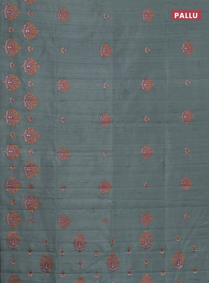Semi raw silk saree green shade with embroidery work buttas and embroidery butta border