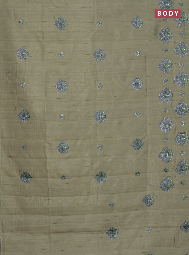 Semi raw silk saree elaichi green with embroidery work buttas and embroidery butta border