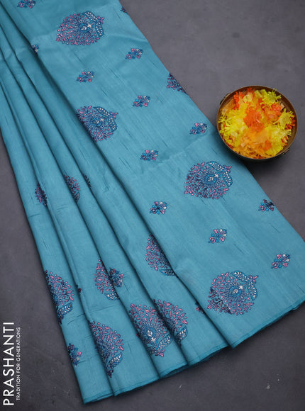 Semi raw silk saree teal blue with embroidery work buttas and embroidery butta border