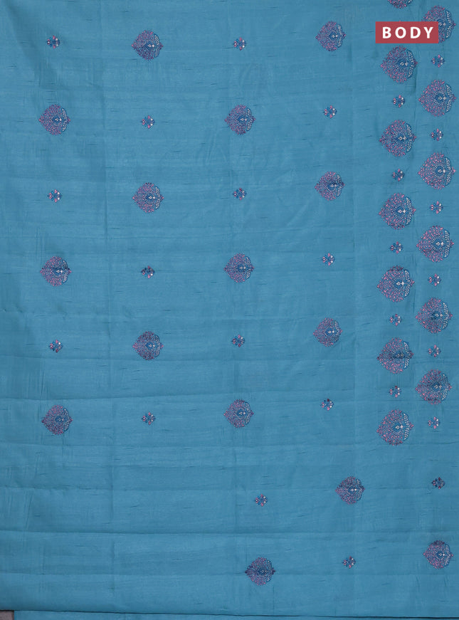 Semi raw silk saree teal blue with embroidery work buttas and embroidery butta border