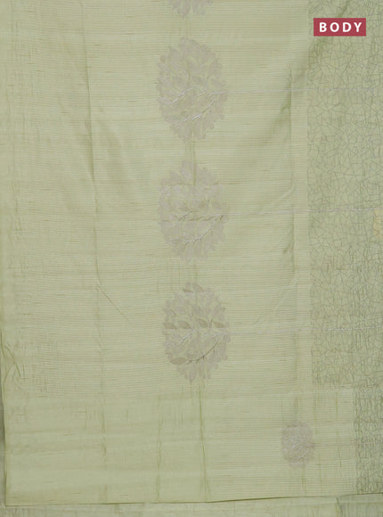 Semi raw silk saree mild pista green with embroidery work buttas and silver zari woven border