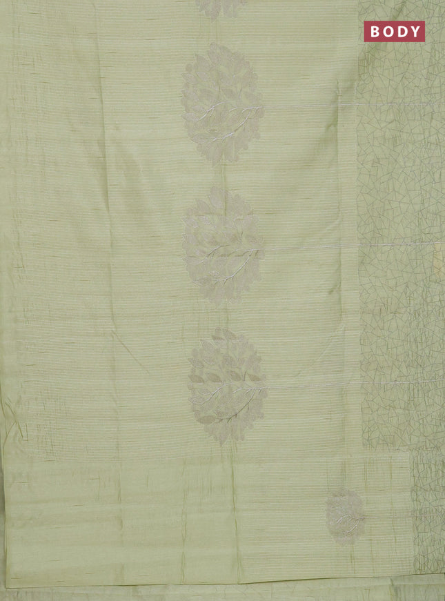 Semi raw silk saree mild pista green with embroidery work buttas and silver zari woven border