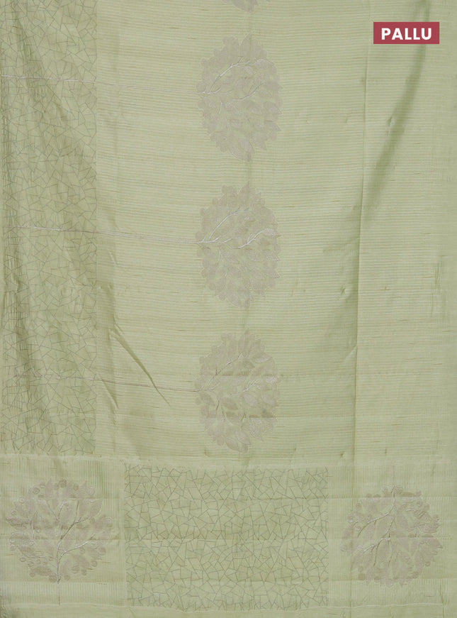 Semi raw silk saree mild pista green with embroidery work buttas and silver zari woven border