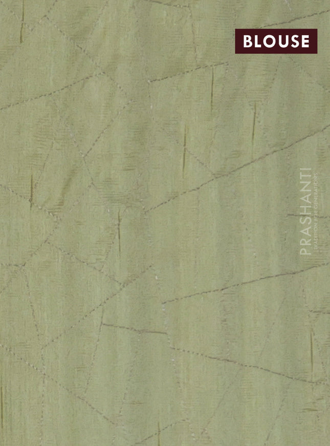 Semi raw silk saree mild pista green with embroidery work buttas and silver zari woven border