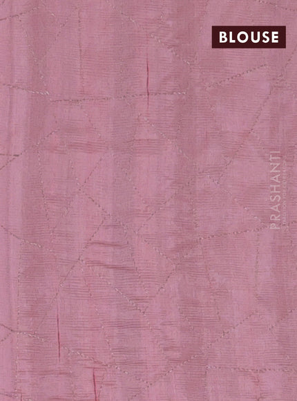 Semi raw silk saree peach shade with embroidery work buttas and silver zari woven border