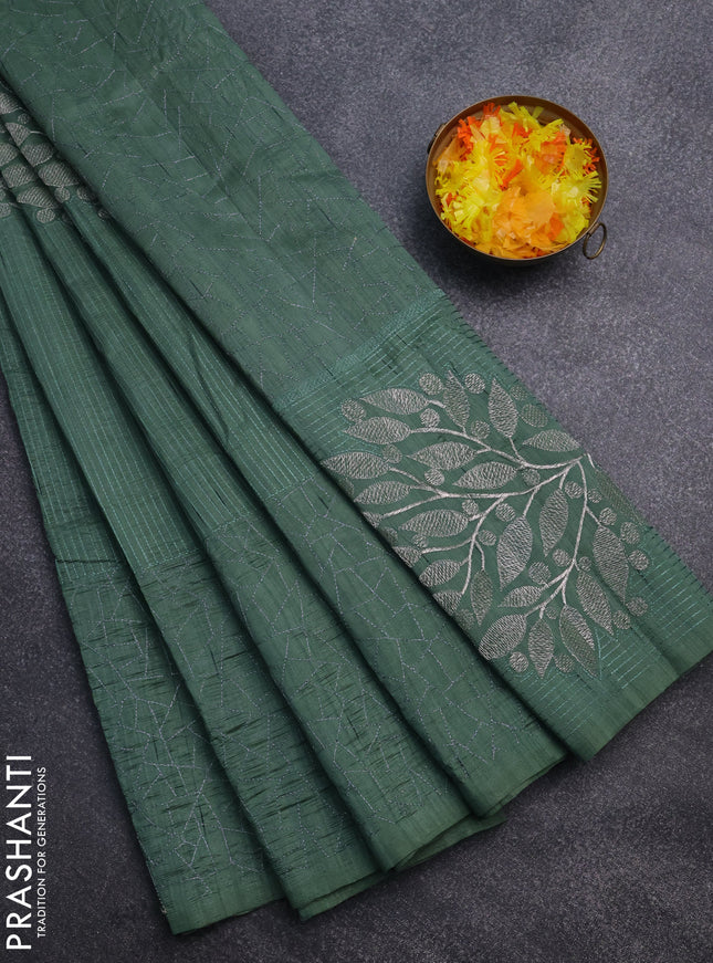 Semi raw silk saree green with embroidery work buttas and silver zari woven border
