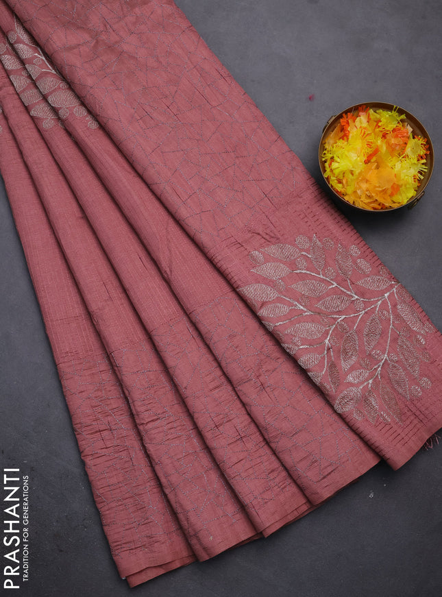 Semi raw silk saree rust shade with embroidery work buttas and silver zari woven border