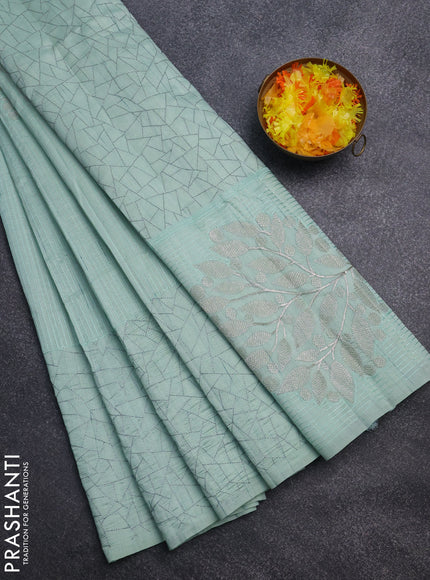 Semi raw silk saree pastel green with embroidery work buttas and silver zari woven border
