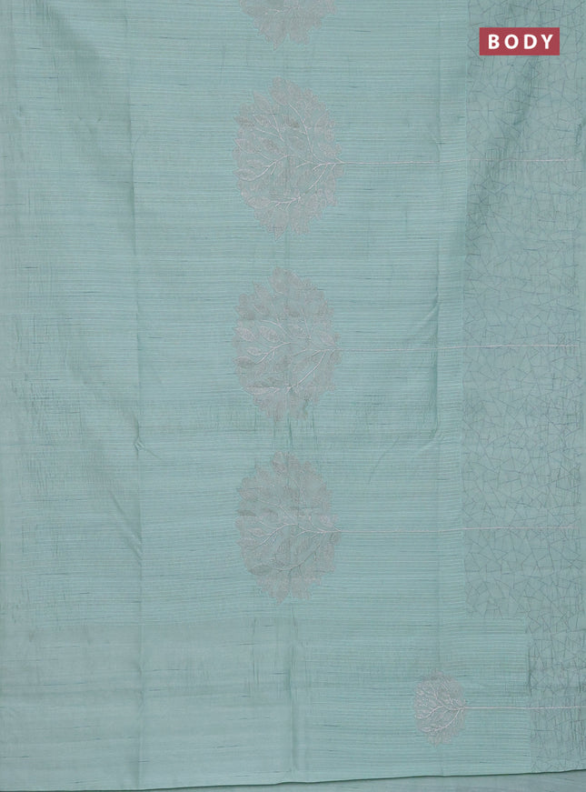 Semi raw silk saree pastel green with embroidery work buttas and silver zari woven border